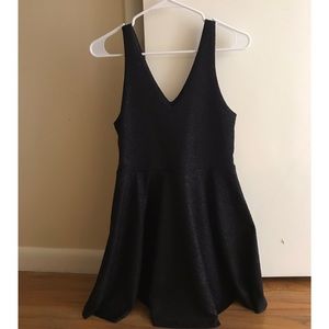 Shiny, short, black cocktail dress